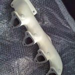 Ceramic coated TU log style header
